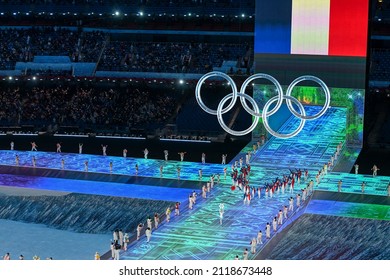 BEIJING, CHINA - FEBRUARY 04: Flag bearers Kevin Rolland and Tessa Worley of Team France carry their flag during the Opening Ceremony of the Beijing 2022 Winter Olympics