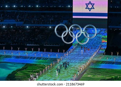 BEIJING, CHINA - FEBRUARY 04: Flag bearers Evgeni Krasnopolski and Noa Szollos of Team Israel carry the flag of Israel during the Opening Ceremony of the Beijing 2022 Winter Olympics