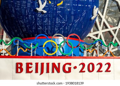 Beijing, China - February 20, 2016: Decorative stand promoting the Beijing Winter Olympic 2022 in front of the Beijing National Stadium Bird's Nest in Beijing, China