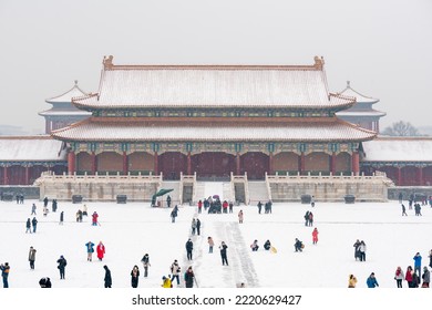 Beijing China, Jan22: The Adults Are Taking Photographs Around And Children Are Playing Snow On The Square In Front Of The Hall Of Supreme Harmony. Photoed In The Forbidden City.