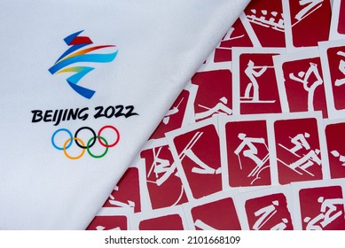 BEIJING, CHINA, JANUARY 1, 2022: Background For Winter Olympic Game In Beijing, China, 2022. Red Pictogram Of All Sports In Background