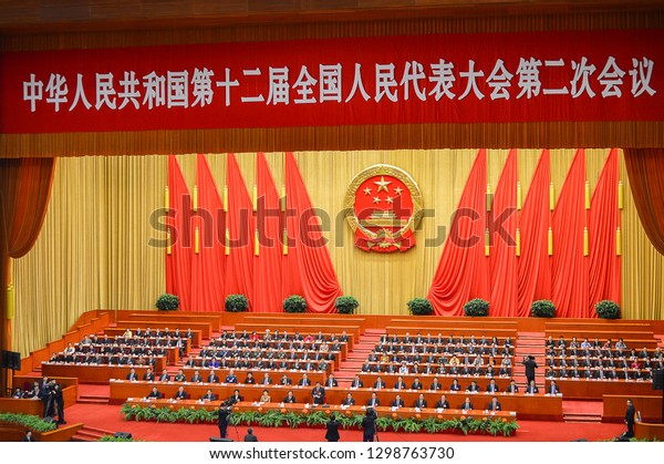 Beijing\
/ China - March 13th 2014: The Central Committee of the Communist\
Party of China, top leadership of the Communist Party of China at a\
session in the Great Hall of the People,\
Beijing