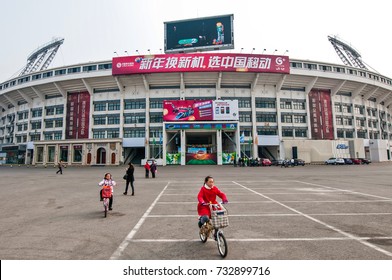 Beijing, China - March 30th, 2013: Group Of Chinese People In Front Of The Workers Stadium Also Called Gongti Or Gong Ti In Chaoyang District