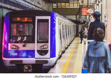 BEIJING, CHINA - MAY 12, 2016: Train arriving in Beijing metro statation