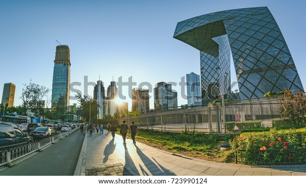 BEIJING, CHINA - MAY 12, 2016: China\
Central Television (CCTV) headquarters during sunset time. It\'s a\
234 m skyscraper. CCTV is the National TV station of\
China.