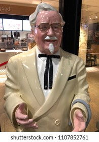 Beijing, China - May 25, 2018: Portrait view of Colonel Sanders model in front of the first china store of KFC, as known as Kentucky Fried Chicken restaurant where is an American fast food in Beijing.