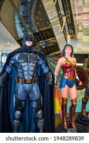 Beijing, China - November 10, 2017:  Statues of characters Batman and Wonder Woman in Justice League movie on display in mall in Beijing.