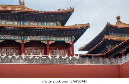 Beijing, China - Oct 30, 2016: At Meridian Gate (Wumen) area, Forbidden City (Gu Gong, Palace Museum). Tiled roof and facade decorated with Chinese pattern. A hazy day.