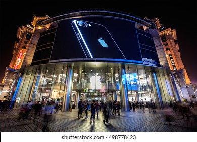 BEIJING, CHINA - OCTOBER 2, 2016: An iPhone 7 is display on a large screen at an Apple Store in Wangfujing Street. Apple's iPhone 7 goes on sale in mainland China from September 16. 