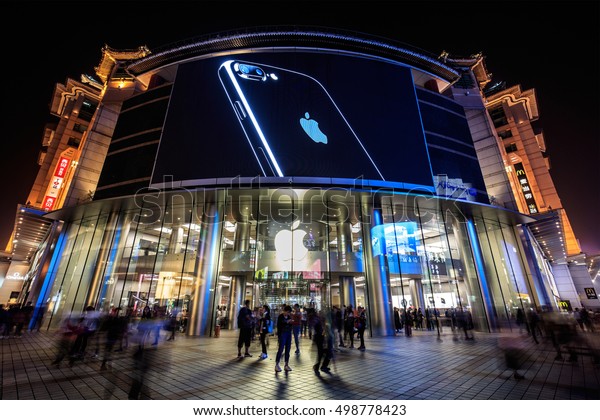 BEIJING, CHINA\
- OCTOBER 2, 2016: An iPhone 7 is display on a large screen at an\
Apple Store in Wangfujing Street. Apple\'s iPhone 7 goes on sale in\
mainland China from September 16.\
