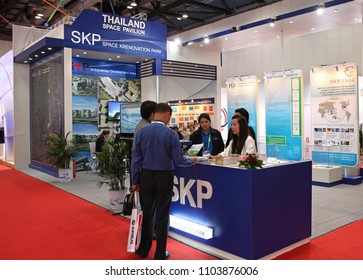 BEIJING, CHINA- SEPTEMBER 24, 2013: Unidentified People Are Seen At The Thailand Space Pavilion During The 64th International Astronautical Congress (IAC 2013). 