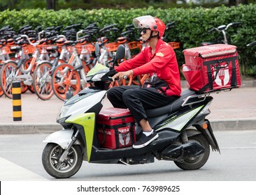 BEIJING, CHINA-JULY 22, 2017: A Baidu Waimai Food Delivery Service Driver Is Seen At City Downtown; Baidu Waimai Food Delivery Service Has More Than 100 Million Active Users Monthly.