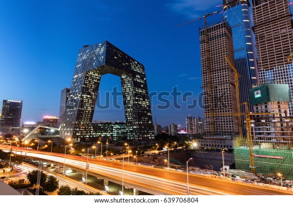 BEIJING, CHINA-MAY 14, 2017: Cityscape of\
Beijing city at dusk. The Belt and Road Forum for International\
Cooperation is held in Beijing on May 14- 15, 2017.\
