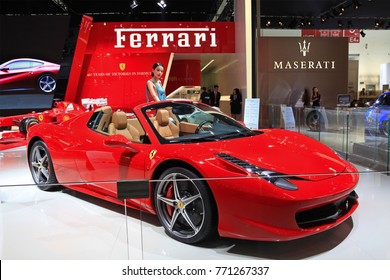 BEIJING, CHINA-MAY 2, 2012:  A Model Stands Beside A Ferrari 458 Spider At The 2012 Beijing International Automotive Exhibition (Auto China 2012)