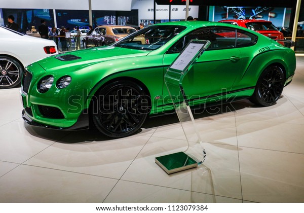 BEIJING CHINA-May 3, 2016: consumers visit\
Bentley(Continental GT3-R) cars at Beijing motor show.\
BentleyMotors Limited is a world-famous super luxury car\
manufacturer, headquartered in Crewe,\
UK.