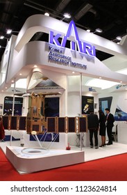 BEIJING, CHINA-SEP. 25, 2013: Unidentified People Is Seen At The Korea Aerospace Research Institute (KARI) Booth During The 64th International Astronautical Congress (IAC 2013). 