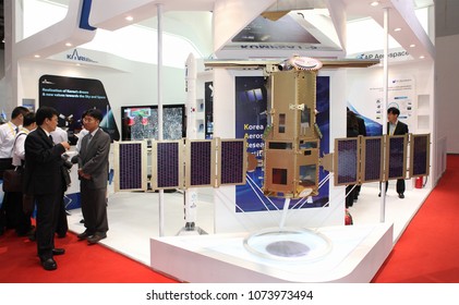 BEIJING, CHINA-SEPTEMBER 23, 2013: Unidentified People Is Seen At The Korea Aerospace Research Institute (KARI) Booth During The 64th International Astronautical Congress (IAC 2013) 