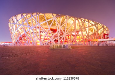 BEIJING - FEB 21: Beijing National Stadium, Also Known As The Bird's Nest, At Dusk On February 21, 2012 In Beijing, China.The 2015 World Championships In Athletics Will Take Place At This Famous Venue