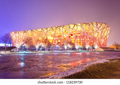 BEIJING - FEB 21: Beijing National Stadium, Also Known As The Bird's Nest, At Dusk On February 21, 2012 In Beijing, China.The 2015 World Championships In Athletics Will Take Place At This Famous Venue