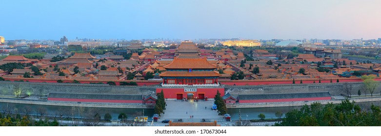 Beijing Forbidden City at dusk with ancient pagoda architecture.