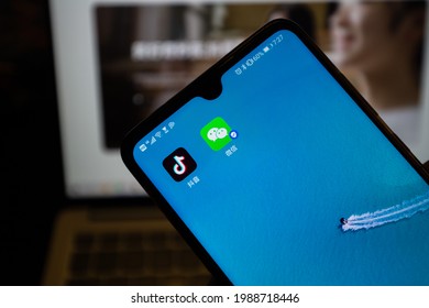 Beijing - June 10, 2021: Logo And Homepage Of Popular Chinese Social Software TikTok And WeChat Apps. The US Government Lifted Its Ban On Chinese Software Such As TikTok And WeChat.