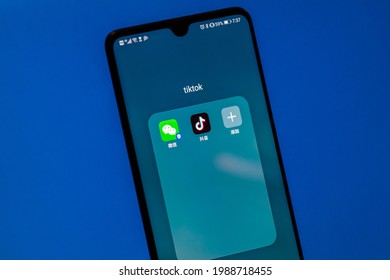 Beijing - June 10, 2021: Logo And Homepage Of Popular Chinese Social Software TikTok And WeChat Apps. The US Government Lifted Its Ban On Chinese Software Such As TikTok And WeChat.