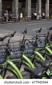 BEIJING LU, GUANGZHOU SHI, GUANGDONG, CHINA - MAY 2017: People And Share Hire Bikes In Guangzhou's Main Shopping Street, Beijing Road - Guangzhou, China.