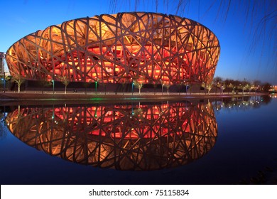 BEIJING - MARCH 26: Beijing National Stadium, Also Known As The Bird's Nest, At Dusk On March 26, 2011 In Beijing, China. The 2015 World Championships In Athletics Will Take Place At This Famous Venue