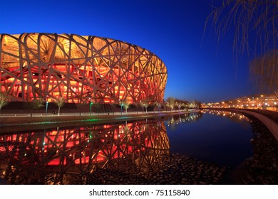 BEIJING - MARCH 26: Beijing National Stadium, Also Known As The Bird's Nest, At Dusk On March 26, 2011 In Beijing, China. The 2015 World Championships In Athletics Will Take Place At This Famous Venue