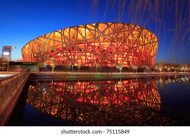 BEIJING - MARCH 26: Beijing National Stadium, Also Known As The Bird's Nest, At Dusk On March 26, 2011 In Beijing, China. The 2015 World Championships In Athletics Will Take Place At This Famous Venue