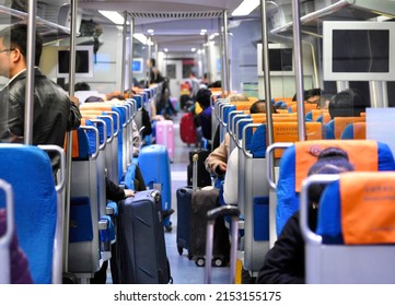 BEIJING - NOV 01: Interior of the Airport express train with luggage and passengers in Beijing, November 01, 2013 in China