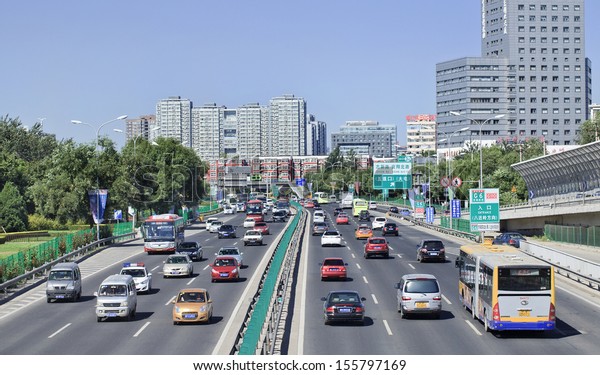 BEIJING - SEPTEMBER 25. Traffic on\
G6 express way in Beijing, China, 25 of September, 2013. Beijing\'s\
economic planner, invites foreign investors to bid on 126 urban\
infrastructure projects seeking $55 billion in\
financing.