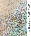 Beijing, Tientsin, China, a photo of a map in a world atlas, suitable to illustrate travel, tourism, trade, economy and politics topics