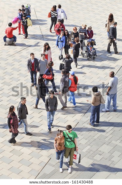 BEIJING-APRIL 4. Chinese and foreigners. 593,832\
foreigners were living in China end 2010, according sixth national\
census, released by National Bureau of Statistics April 2011.\
Beijing, April, 2012.\
