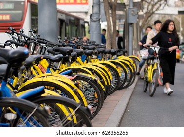 BEIJING,CHINA -  23 APRIL 2017: Ofo Bicycles In Beijing, China. Ofo Is A Popular Bike Sharing Platform Where Users Grab Bikes Through An App In Many Cities In China