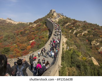 Beijing,China-October 16, 2010: Crowd Tourists Climb Badaling Great Wall In Autumn