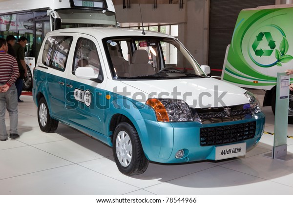 BEIJING-MAY 20: An electric taxi is on display at\
the 14th China Beijing International High-tech Expo (CHITEC) on May\
20, 2011 in Beijing, China. CHITEC is a major National hi-tech\
Expo.