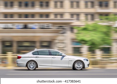 BEIJING-MAY 4, 2016. BMW 5 Series L On The Road. BMW Sales Will Be Hit In 2016 By Cut-throat Competition, Slowing Chinese Economy And Recent Government Crackdown On Graft And Conspicuous Consumption.