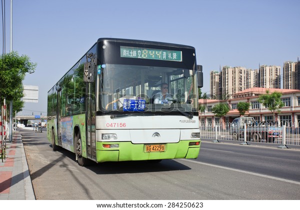 BEIJING-MAY 7, 2015. Public bus stop in\
Beijing. Public bus service in Beijing is among the most extensive,\
widely used and affordable form of public transportation in urban\
and suburban\
districts.