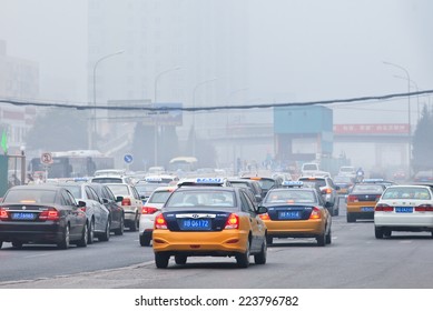 BEIJING-OCT. 6, 2013. Traffic jam in a smog blanketed city center. Pollution in Beijing is now so dense that its effects are comparable to that of a nuclear winter, Chinese scientists have said.
