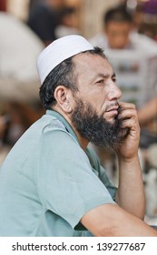 BEIJING-SEPT. 8. Muslim Vendor On A Market.  According A Pew Research Center Study, Based On China's Census, There Are 21,667,000 Muslims In China, 1.6% Of Total Population. Beijing, Sept. 8, 2007. 