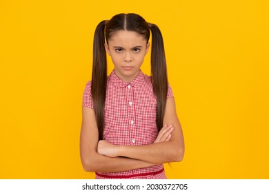 Being in capricious mood. Stubborn child yellow background. Girl with stubborn character
