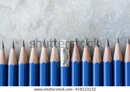Being different concept. Going against the grain or moving upstream. Pencils headed all one way except for one rushing the other way around.  Stop burying your head in the sand.