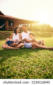 Being with family is bliss. Shot of a happy family bonding together outdoors. - Shutterstock ID 2134116045