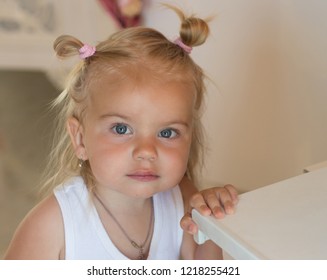 Being A Real Cutie. Small Girl With Bun Ponytails. Small Child Wear Funny Hairstyle. Adorable Child With Blond Hair. Fancy Girls Hairstyle. Hair Salon For Kids. Fancy Stuff.