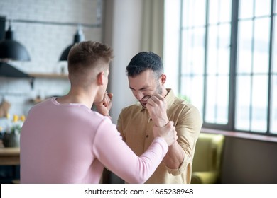 Being Rude. Two Young Men Fighting And Looking Agressive