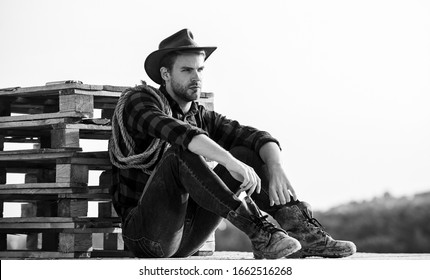 Being A Texan. Vintage Style Man. Wild West Retro Cowboy. Cowboy With Lasso Rope. Western. Wild West Rodeo. Thoughtful Man In Hat Relax. Western Cowboy Portrait. Man Checkered Shirt On Ranch.