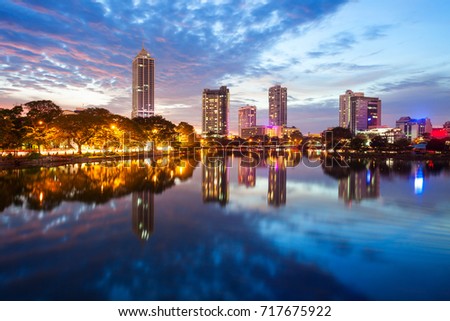 Beira lake and Colombo city skyline view at sunset. Beira lake is a lake in the center of the Colombo in Sri Lanka.