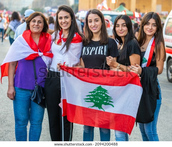 Beirut,\
Lebanon - October 27, 2019 - Girls holding the Lebanese Flag in\
Demonstration against the Lebanese\
Government