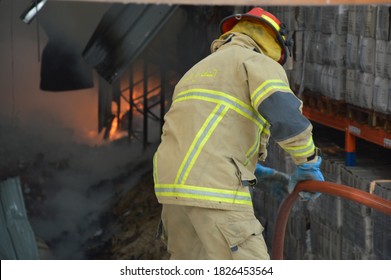 Beirut/Lebanon - September 10 2020: Lebanese Civil Defense Firefighter Try To Extinguish A Fire At Beirut's Port